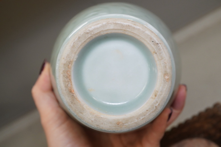 A Chinese celadon glazed vase, marble inset hardwood stand, 18th century Chinese Export blue and white plate, pot and cover and a circular wood stand, tallest 20cm. Condition - fair to good